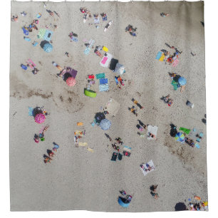 Aerial photo of people sunbathing on the beach