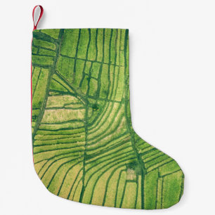 Aerial photography of green farm field small christmas stocking