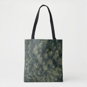 Aerial photography of green trees tote bag