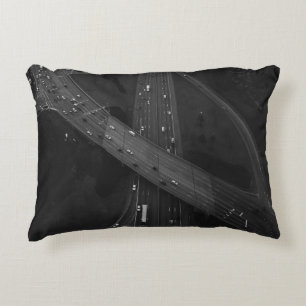AERIAL PHOTOGRAPHY OF VEHICLE ON ROAD ACCENT PILLOW