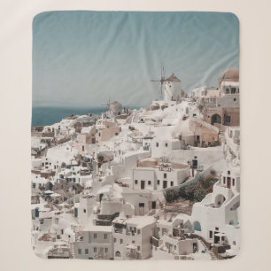 AERIAL PHOTOGRAPHY OF WHITE CONCRETE BUILDINGS DUR SHERPA BLANKET