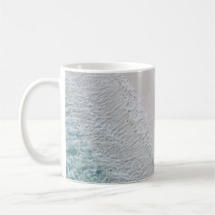 AERIAL PHOTOGRAPHY OF WHITE SAND SEASHORE AND GREE COFFEE MUG