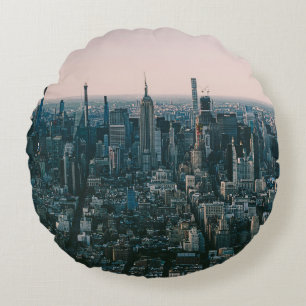AERIAL VIEW OF CITY BUILDINGS DURING DAYTIME ROUND PILLOW