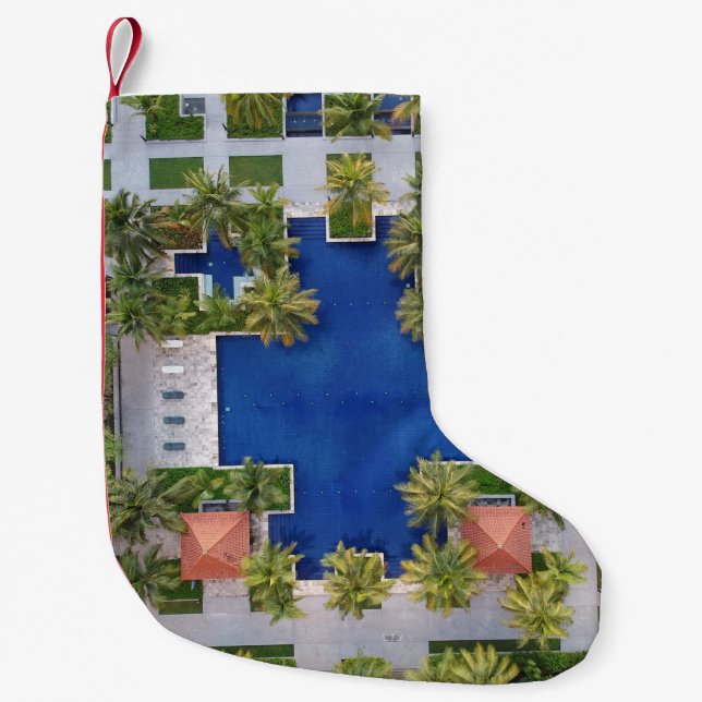 Aerial view of pool surrounded by palm trees small christmas stocking (Front)