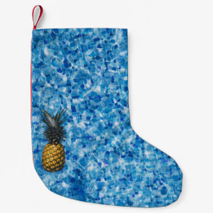 Aerial view photography of pineapple on body of wa small christmas stocking
