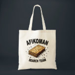 Afikoman search team Hanukkah Jewish Food Lovers Tote Bag<br><div class="desc">Hanukkah tradition,  Afikoman search,  Jewish holiday,  holiday fun,  Hanukkah 2024,  festive Judaism,  Afikoman graphic,  Jewish celebration,  Hanukkah game,  holiday search,  Jewish traditions,  Hanukkah spirit</div>