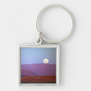 Africa, Namibia, Sossusvlei. A full moon rests Keychain