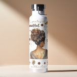 African Woman With Brown Hair Boho Affirmation Water Bottle<br><div class="desc">Empower your day with this uplifting watercolor boho affirmation water bottle. Featuring a beautiful illustration of an African woman, this bottle is a reminder to embrace your natural beauty and celebrate your strength. The inspiring affirmations printed on the bottle will encourage you to stay positive and focused on your goals....</div>