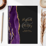 Agate Geode Script Purple Gold Dark Wedding Plans Planner<br><div class="desc">This elegant modern wedding planner features a purple watercolor design trimmed with faux gold glitter. Easily customize the gold-coloured text on an off-black background, with the names of the bride and groom in handwriting calligraphy over a large grey ampersand. Add the title and wedding date below in italics. The back...</div>