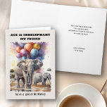 Age is Irrelephant Elephants Funny Birthday Card<br><div class="desc">Funny birthday card lettered with elephant themed play on words "age is irrelephant". You can personalize the card front and the message inside. Design features watercolor illustration of elephants on the savannah with colourful birthday balloons drifting into the sky. Fun card with light-hearted, age related humour for friend or relative...</div>