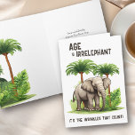 Age is Irrelephant Wrinkle Elephant Funny Birthday Card<br><div class="desc">Funny birthday card lettered with "Age is irrelephant .. it's the wrinkles that count!". Design features a handsome elephant framed with tropical palm trees and jungle greenery. You can personalize the birthday greeting inside and also have the option to add a sign off with your name(s) if you wish.</div>