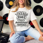Aged To Perfection Personalized Vintage Birthday T-Shirt<br><div class="desc">Celebrate milestone birthdays with style and humour in our Aged to Perfection Personalized Vintage Birthday T-Shirt. Designed for whiskey-themed birthday parties, this shirt features a classic vintage look that resonates with timeless charm. Whether you're marking a 30th, 40th, 50th, or any special year, the "Aged to Perfection" motif captures the...</div>