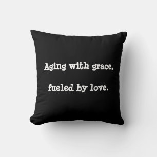 Aging with grace, fuelled by love. throw pillow