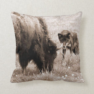 Agressive bison and black wolf throw pillow