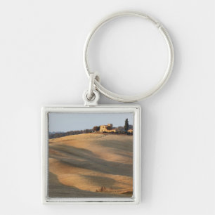 Agricultural field at sunset, Val d'Orcia, Tusca Keychain