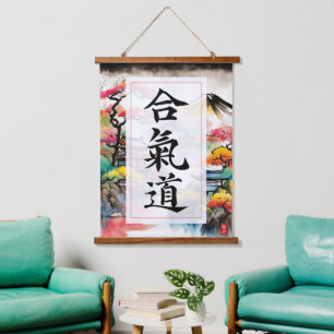 Aikido accrochant la tapisserie