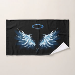 Ailes d'ange bleues lumineuses sur fond noir