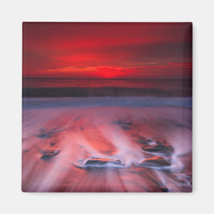 Aimant Aube au-dessus de la mer orageuse