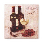 Bouteilles de vin, verre de vin et raisins