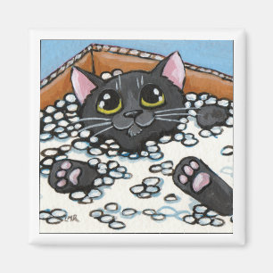 Aimant Chat noir dans une boîte d'arachides d'emballage  