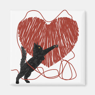Aimant Chat Noir Jouant Déraviser le Coeur Rouge