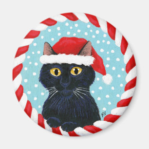 Aimant Chat noir mignon, chapeau de Santa, neige d'hiver 