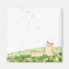 Chats amusants chantant sous les fleurs de cerisie