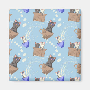 Aimant Chats en boîte et gouttes de lait sur bleu