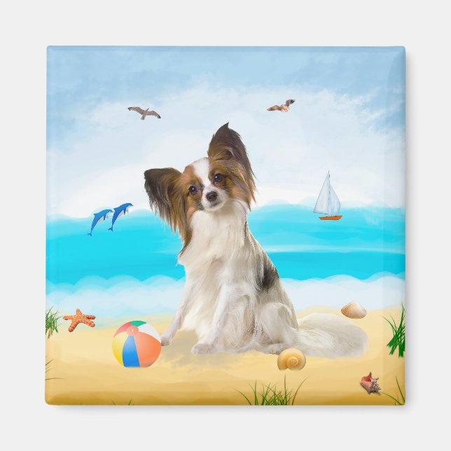 Aimant Chien de Papillon sur la plage (Devant)