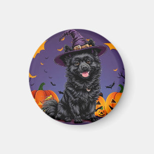 Aimant Chien heureux portant un chapeau de sorcière