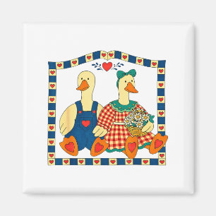 Aimant Couple de canards d'art populaire avec fleurs Mais
