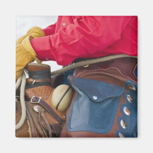Aimant Cowboy à cheval portant des Chaps en cuir
