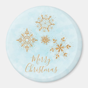 Aimant Cristaux de flocon doré sur Noël bleu gelé