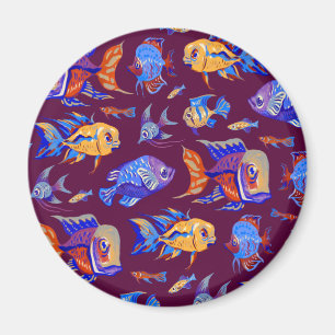 Aimant Des poissons tropicaux amusants sur le violet fonc