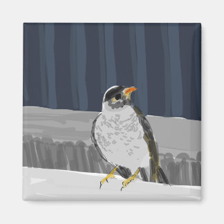 Aimant d'oiseau sur un rail