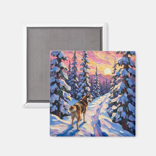 Aimant Husky vintage sur un sentier forestier enneigé de