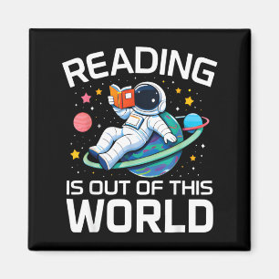 Aimant La lecture est un astronaute de l'espace hors de c
