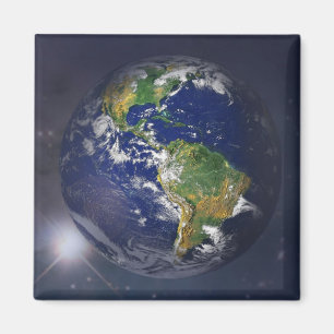 Aimant La terre de planète se levant au-dessus du soleil