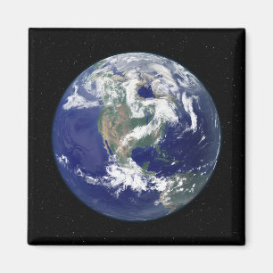 Aimant La terre entièrement allumée portée sur l'Amér