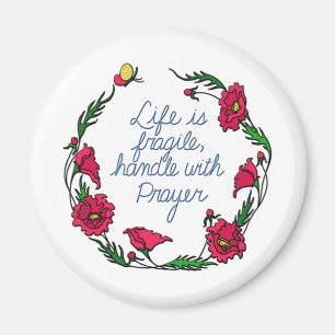 Aimant La vie est une poignée fragile avec la couronne de