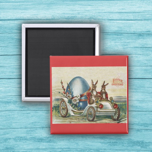 Aimant Lapins de Pâques en voiture antique Grand Oeuf Ble (Vintage rabbits riding in white car with big blue Easter Egg on red magnet.)