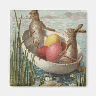 Aimant Les lapins de Pâques dans un bateau avec des oeufs