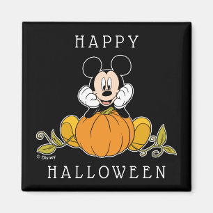 Aimant Mickey Mouse assis sur une citrouille