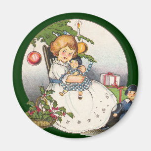 Aimant Noël vintage, Joyeuse fille jouant avec des poupée