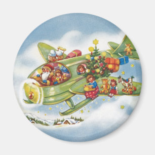 Aimant Noël vintage, le Père Noël vole un avion