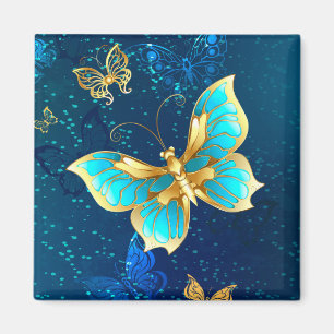 Aimant Papillons d'or sur un Arrière - plan bleu