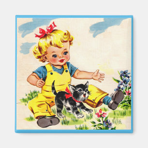 Aimant petite fille adorable avec le petit chaton