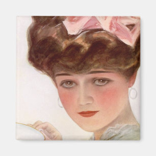 Aimant sirotant de thé