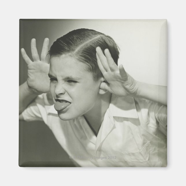 Aimant Un garçon qui fait son visage (Devant)