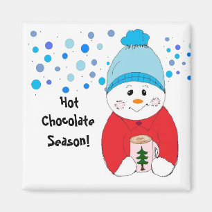 Aimant Un Snowman Sirote Du Chocolat Chaud